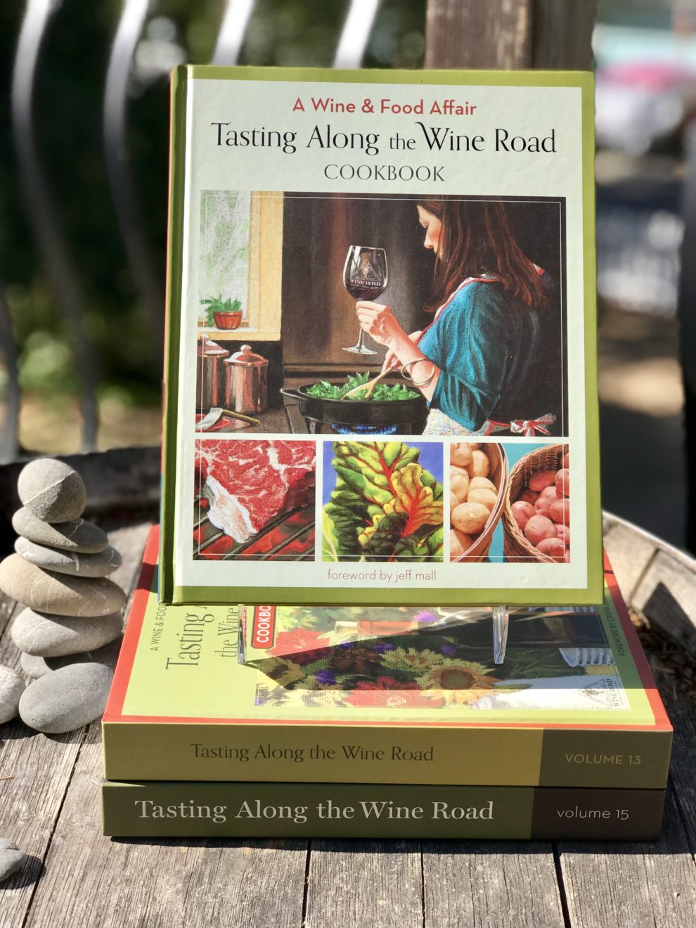 A Wine and Food Affair Tasting Along the Wine Road Cookbook foreword by Jeff Mall Volume 14 attractively displayed on a barrel