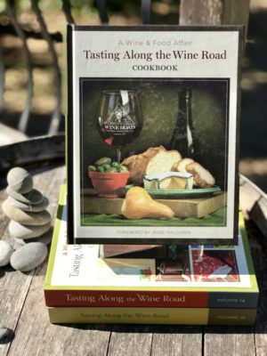 A Wine and Food Affair Tasting Along the Wine Road Cookbook foreword by Jesse Mallgren Volume 15 attractively displayed on a barrel