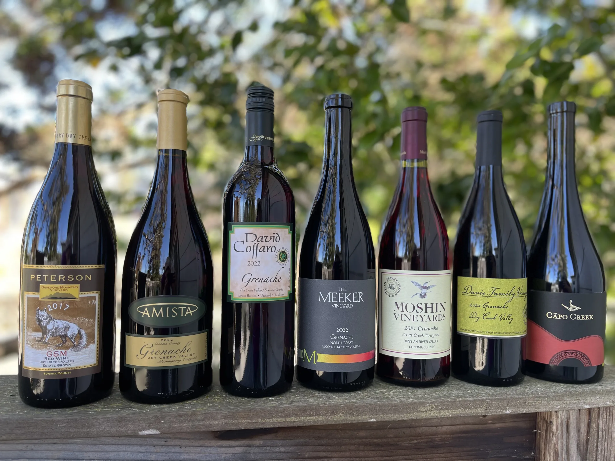 A lineup of 6 bottles of Grenache from Sonoma County
